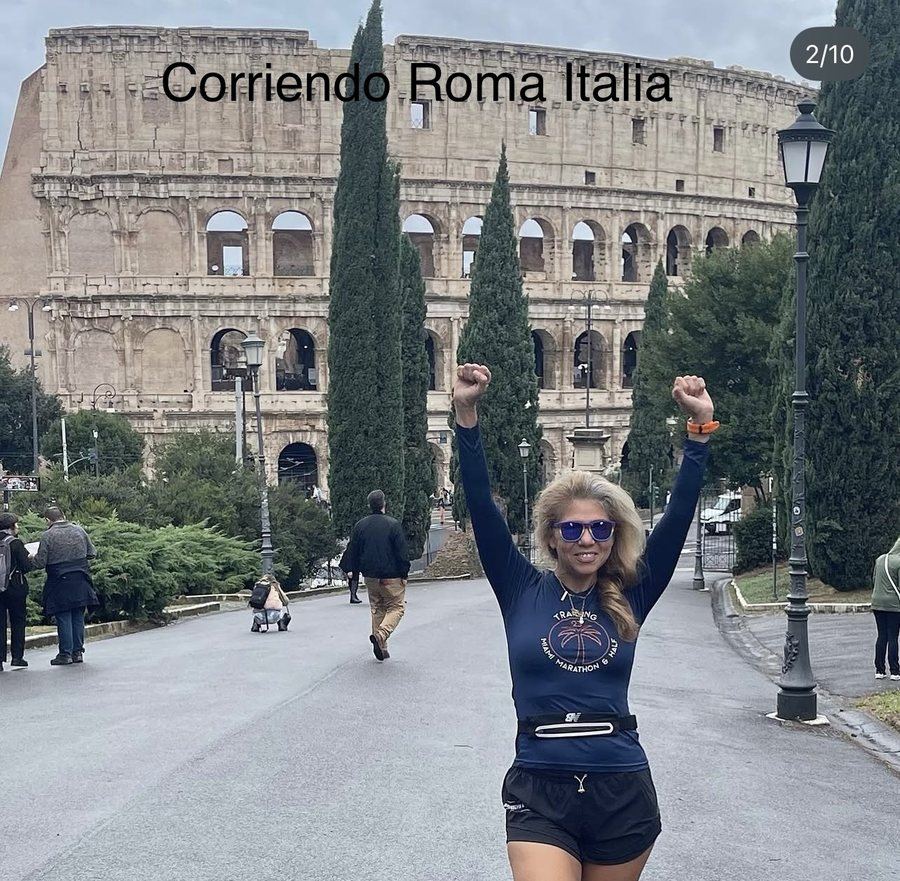 Dr. Karina Rieke running in front of the Colosseum, Rome