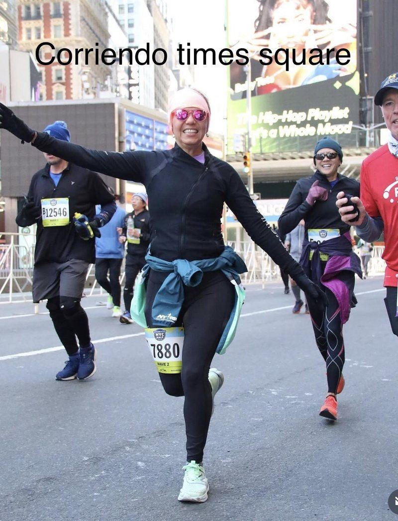 Dr. Karina Rieke running through Times Square, New York